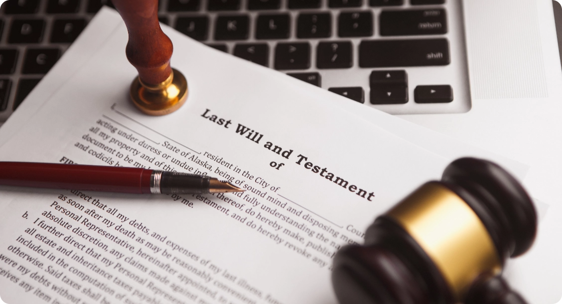 Close view of legal document on a keyboard that reads Last Will and Testament.